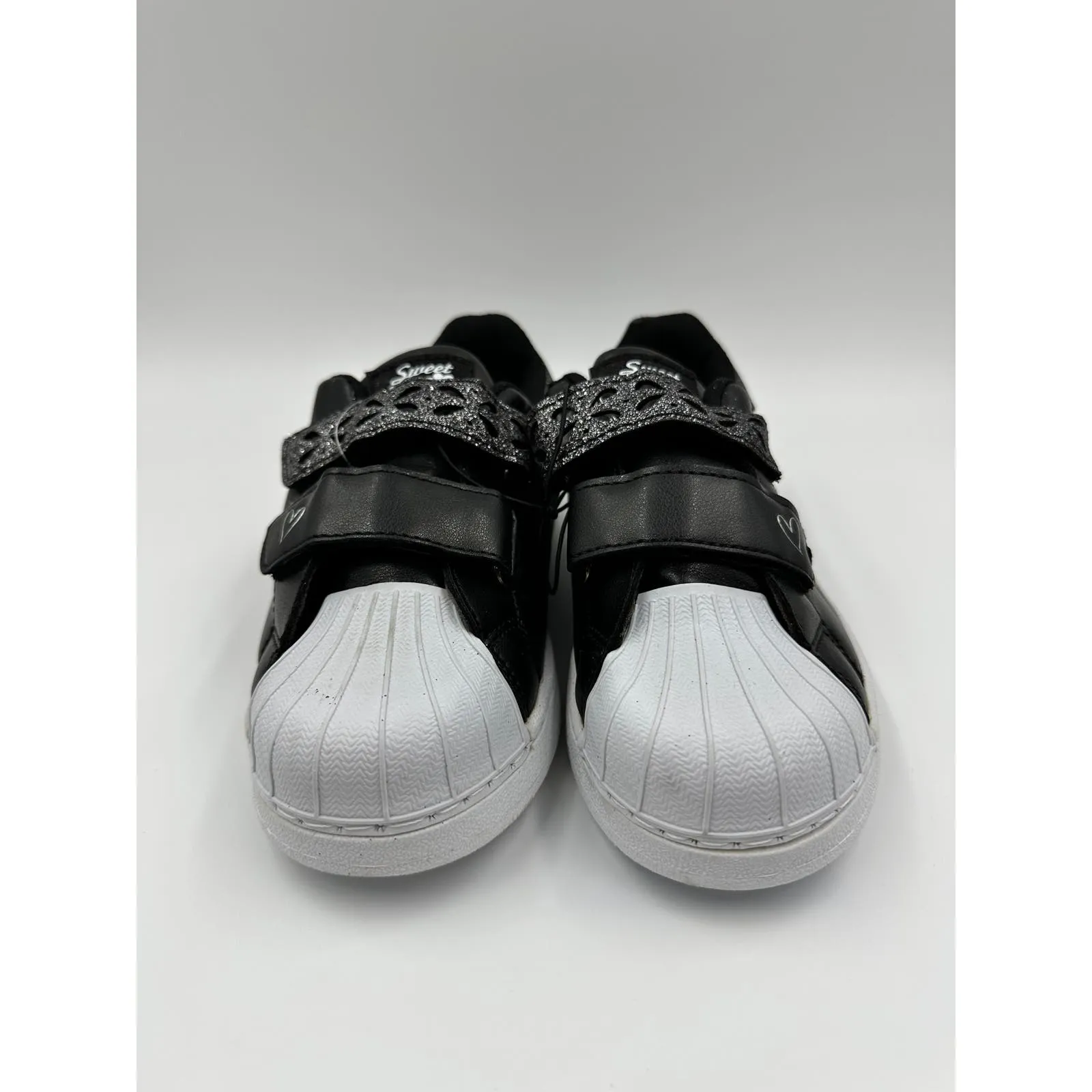 Big Kid Size 4, Black Sneakers with White Toe and Straps with Some Heart Details