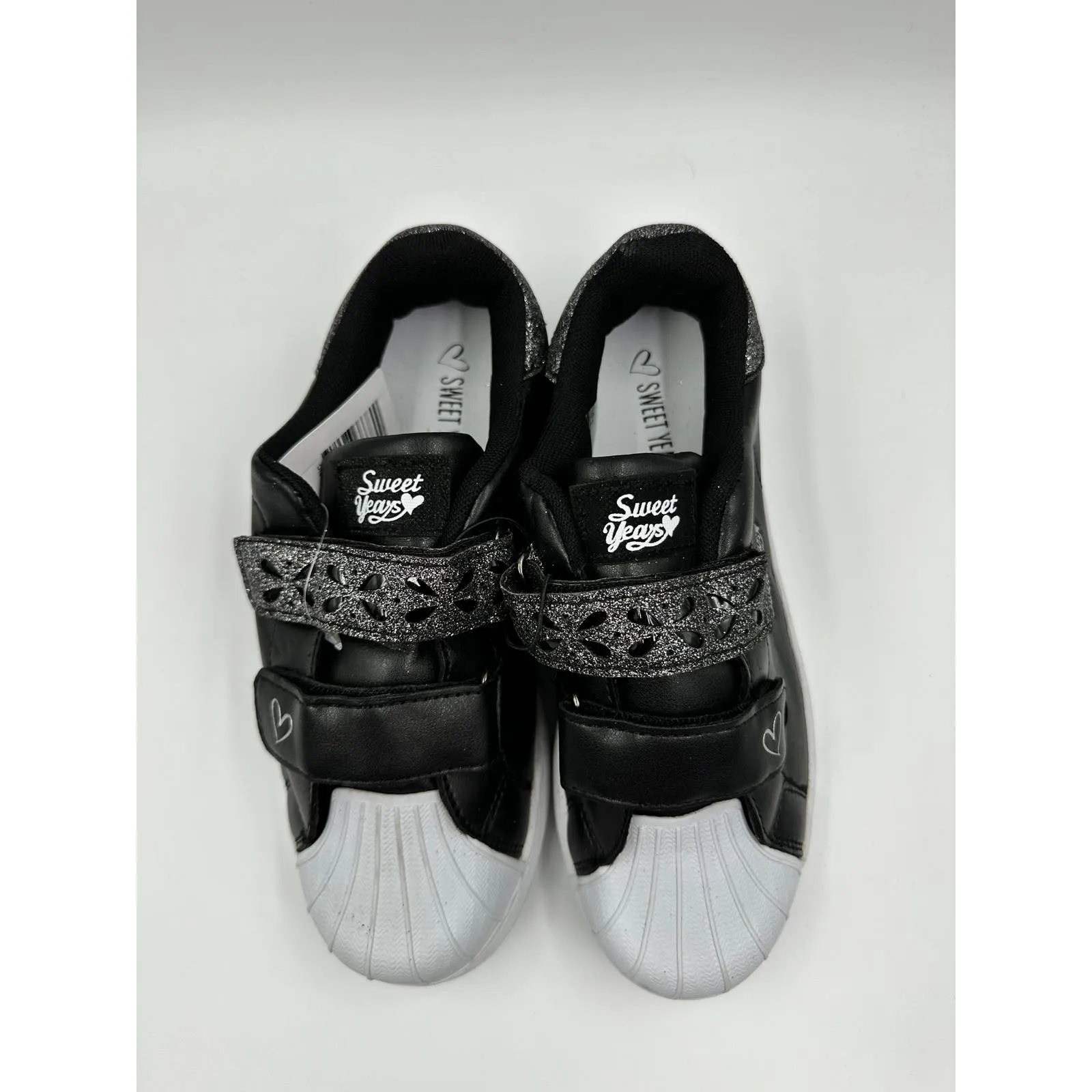 Big Kid Size 4, Black Sneakers with White Toe and Straps with Some Heart Details